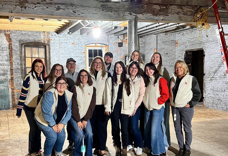 kco-the-team-inside-construction-space